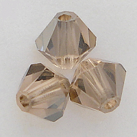swarovski-crystal-5301-and-5328-bicone-beads-light-peach-satin-wholesale.png